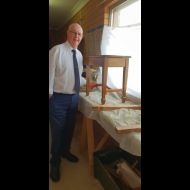 Mayor Graeme Hanger with 100 year old piano tool restored by Doug Kinlyside